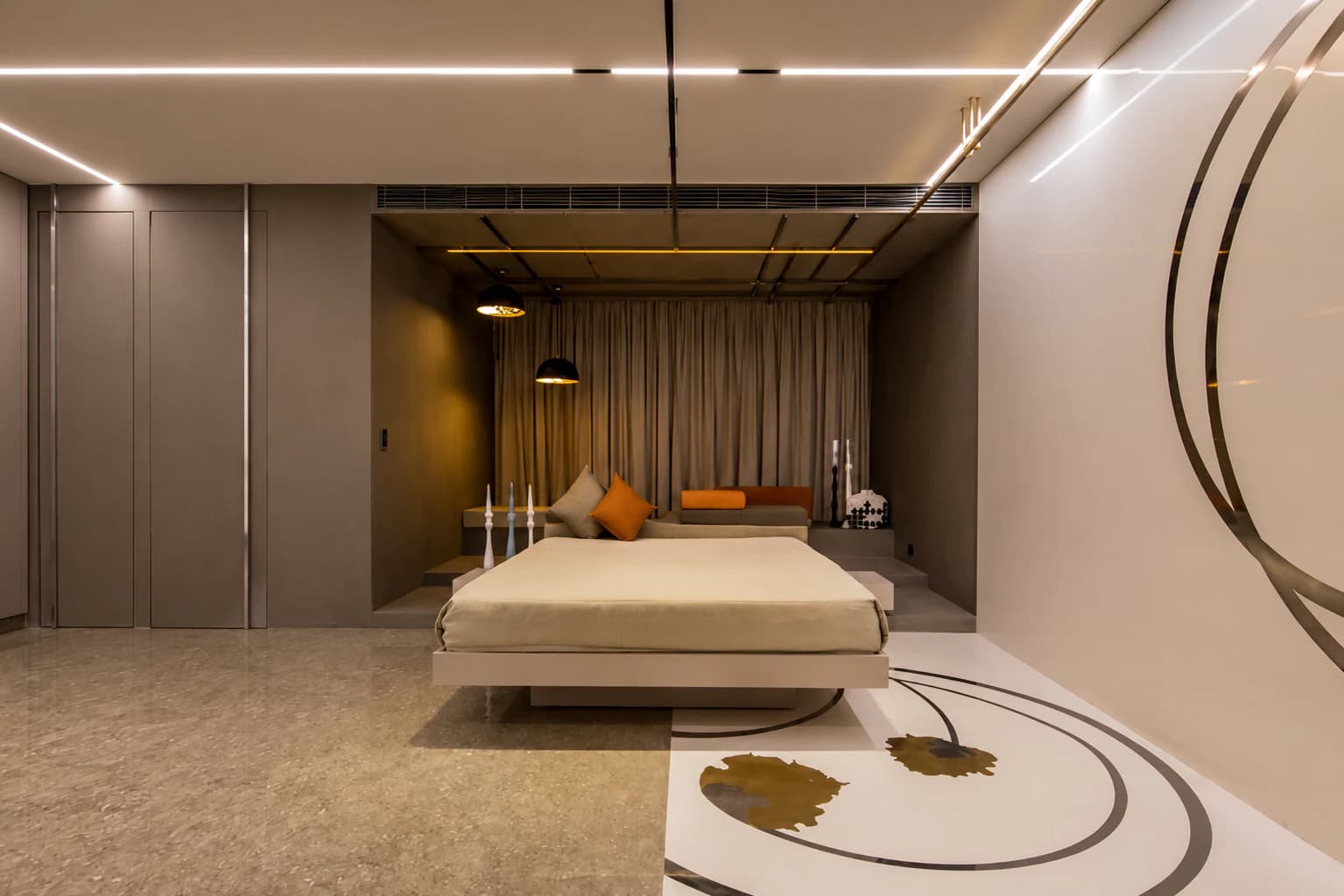 Bedroom with integrated cove and accent lighting delivered by Synchronos.