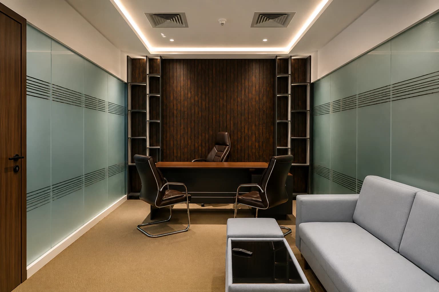 Commercial office interior delivered by Synchronos, with coordinated ceiling systems, lighting and workstations.